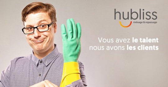 Man wearing black glasses pulling on rubber glove