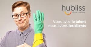 Man wearing black glasses pulling on rubber glove